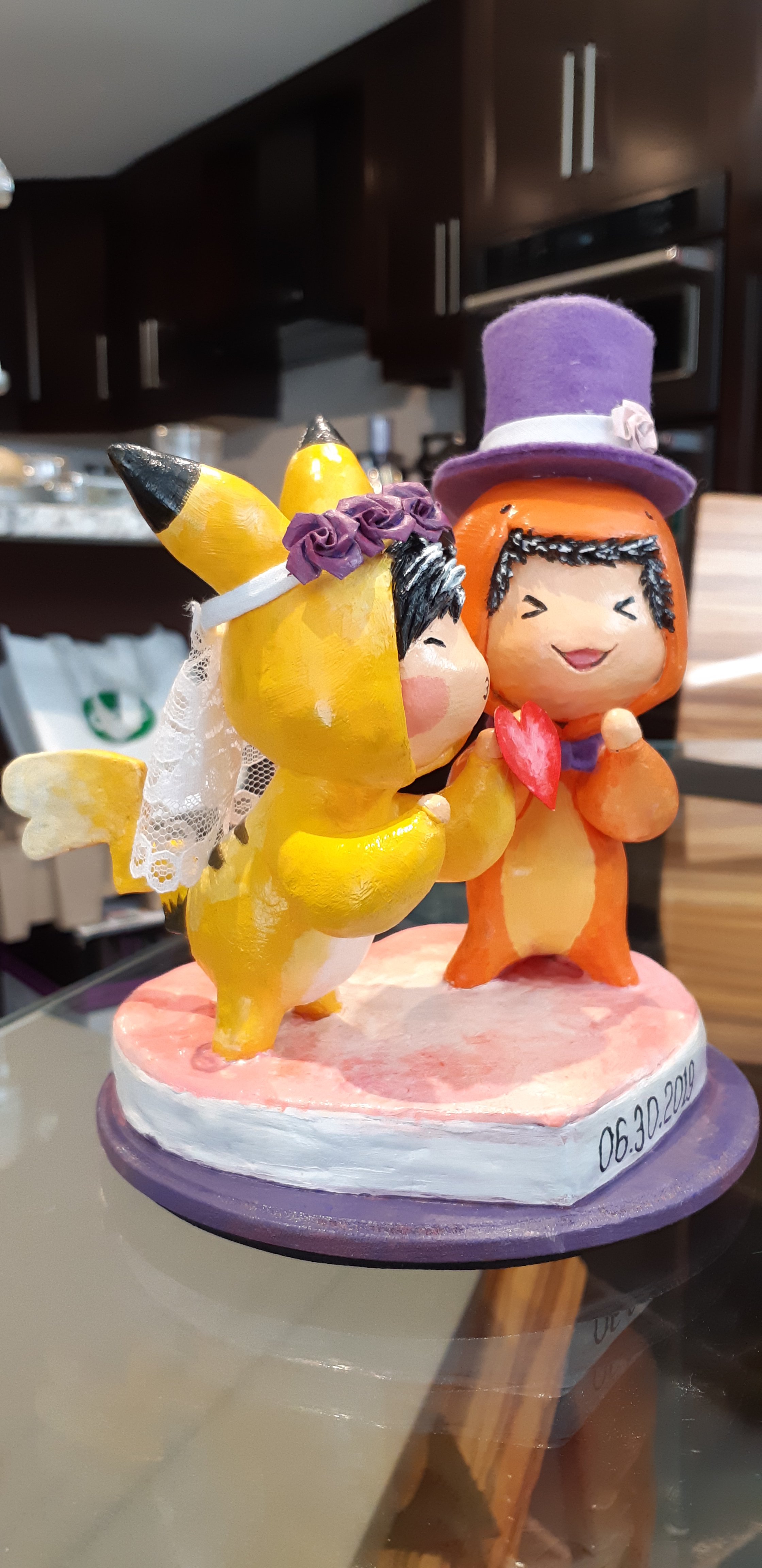 This is the completed sculpture, showing it at an angle to resemble the kissing scene in the ink drawing. 