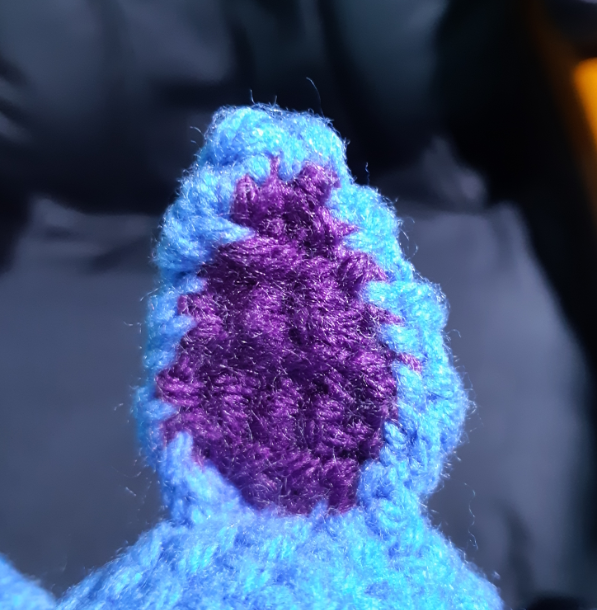 A work-in-progress photo of the Zubat, showing the crocheted ear on the head.
