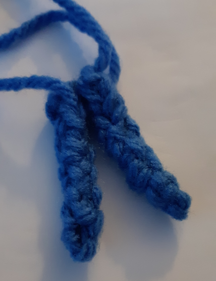 A work-in-progress photo of the Zubat, showing the crocheted tail folded together.