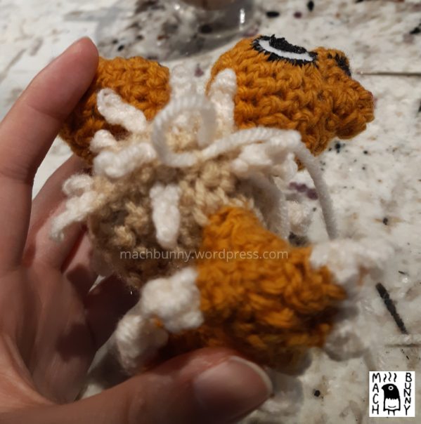 Chiks the Beta Pokemon amigurumi, W.I.P. view of making a new fluff piece, using a loop to begin the process.
