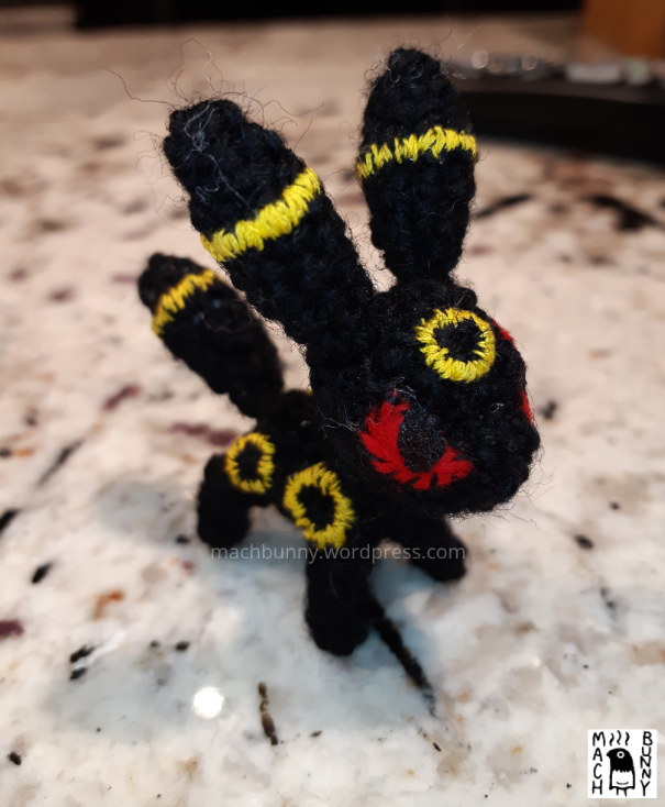 Tiny amigurumi Umbreon, front view