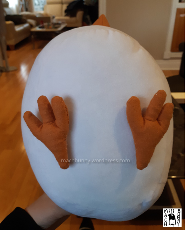 Marshmallow finch plush, bottom view