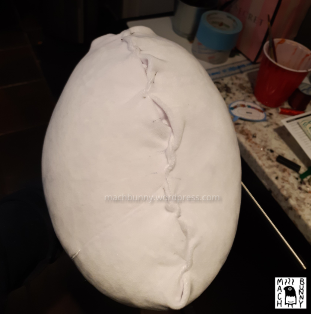 Marshmallow finch plush, with sides pinned together