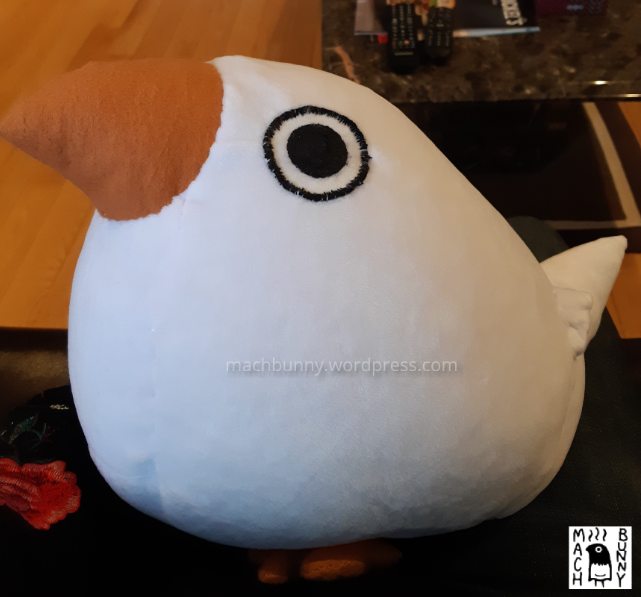 Marshmallow finch plush, front view to the side