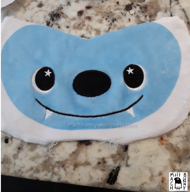 Original plush face, with peak cut off for wing tips