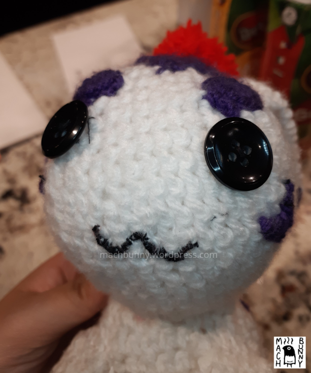 Amigurumi Gomamon, showing the front view of the face