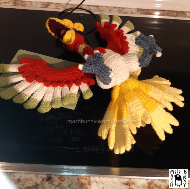 Ho-oh amigurumi, lying on the floor