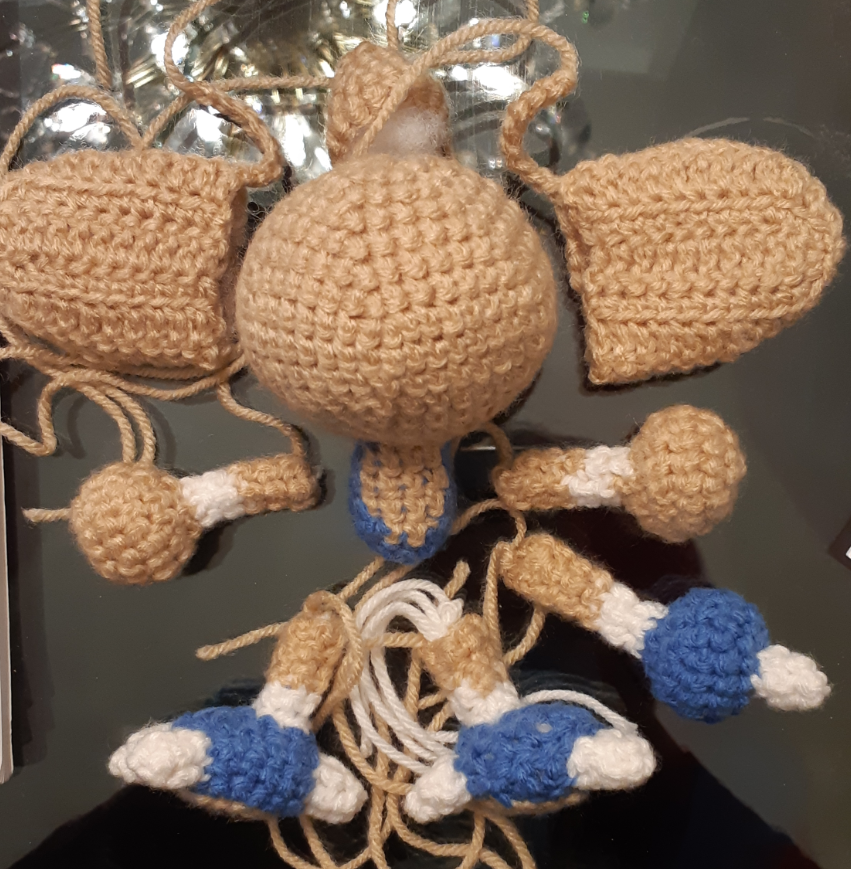 Hitmontop amigurumi, front view of all pieces laid out