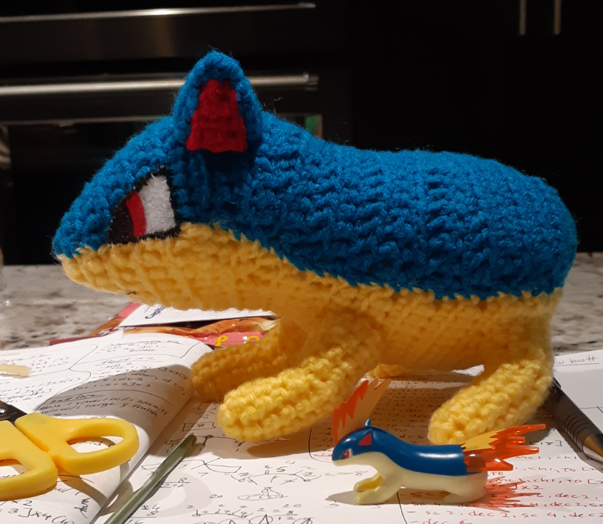 Quilava Amigurumi, side view without flames and figurine comparison