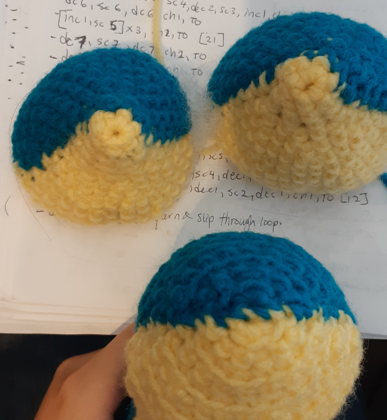 Quilava amigurumi trial pieces and final piece comparison