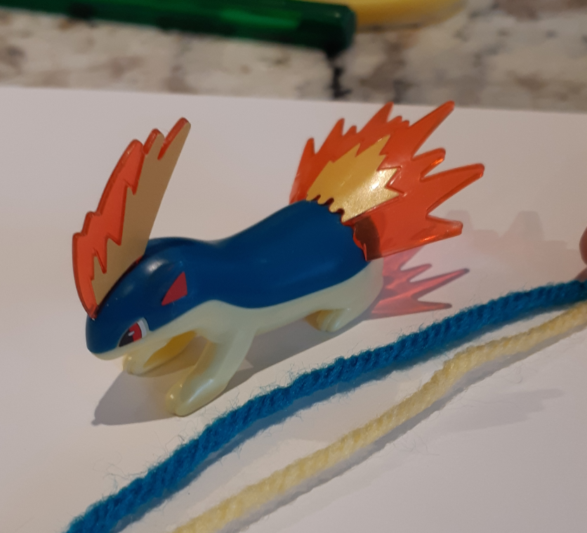 Quilava figurine, with yarn colour comparsion