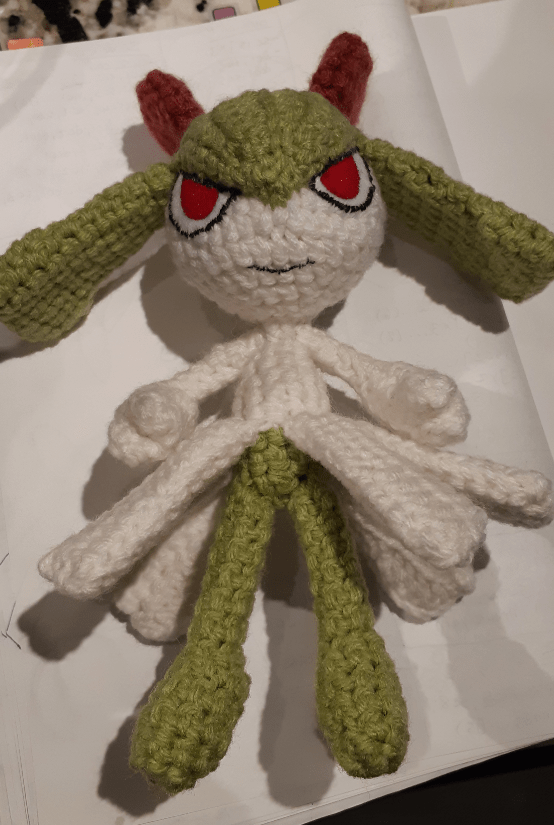 Amigurumi Kirlia, showing eye base colour painted on