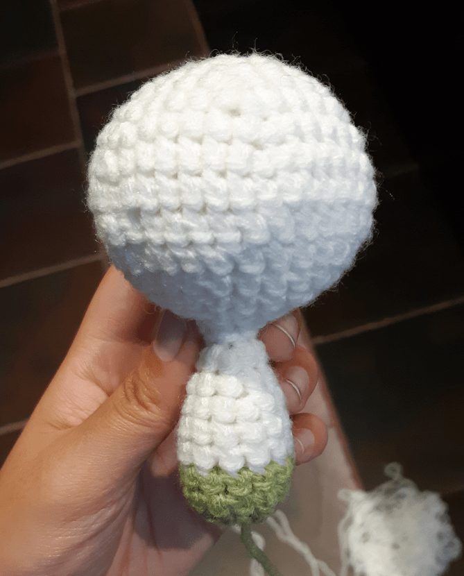 Amigurumi Kirlia, front view of head and body piece