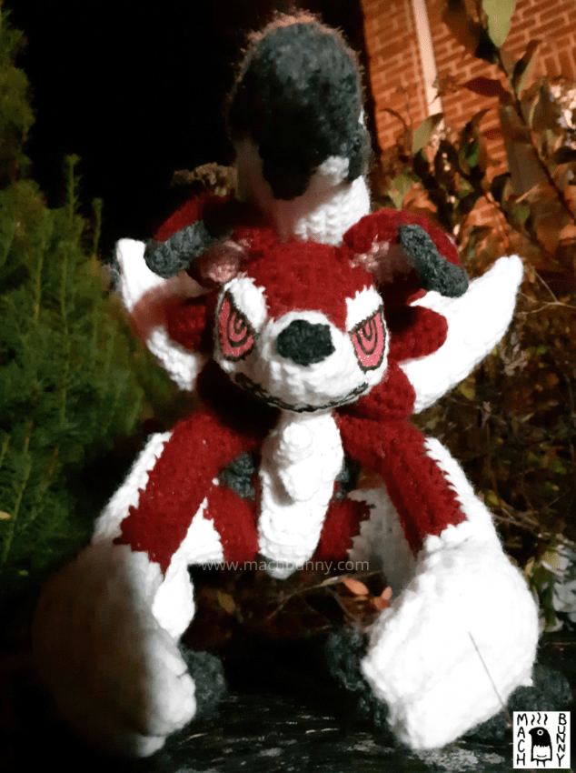 Amigurumi Lycanroc Midnight form, front view from head on and below 