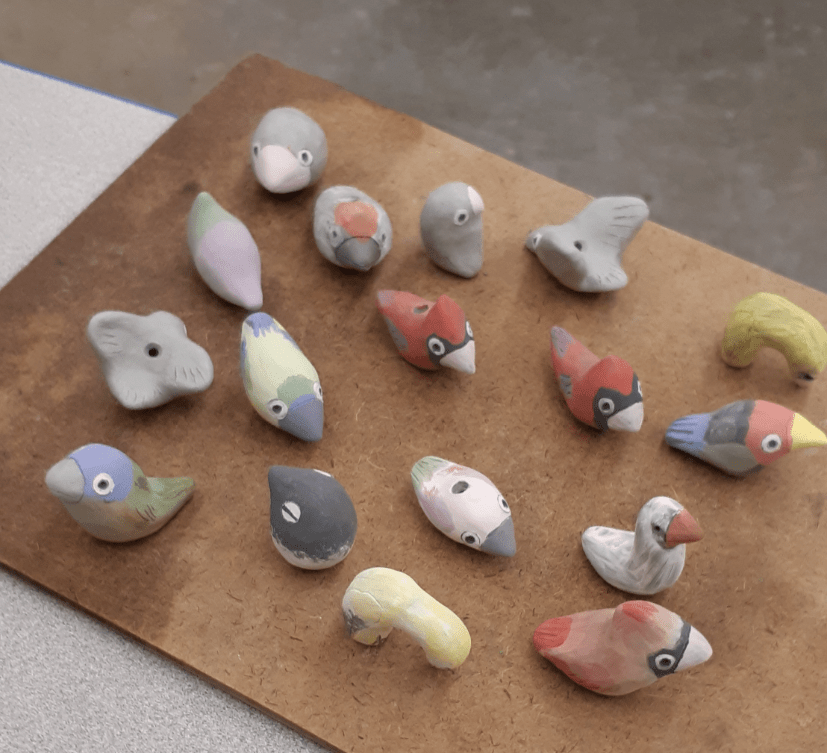 Clay birds with underglaze