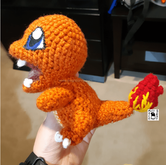 Amigurumi Charmander, side view pointing left