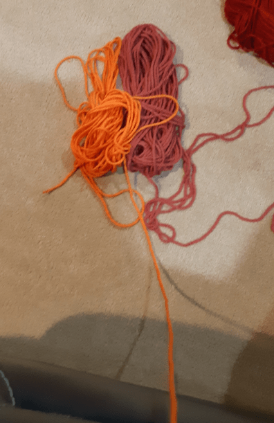 Remaining amount of orange yarn before making the limbs.