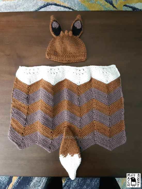 Eevee hat and blanket set, showing the blanket fully opened.